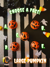 Load image into Gallery viewer, black and white stripe background with 5 pumpkin faces as the subject focus to choose from. Text reads "choose a face! Large Pumpkin."
