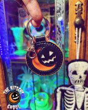 Load image into Gallery viewer, Harvest Eclipse: Glow In The Dark TKG logo Keychain
